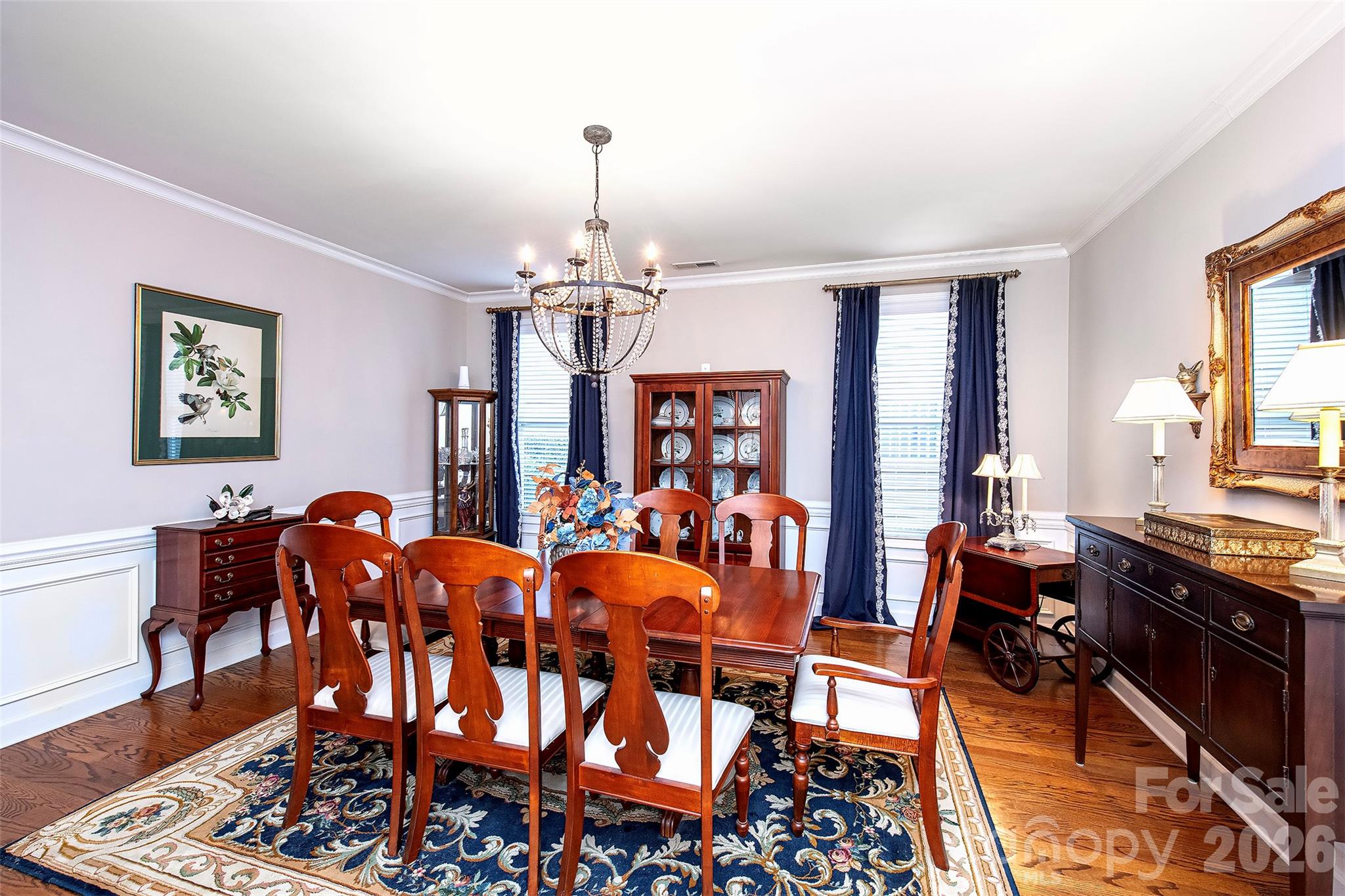 18432 East Marbella Lane Fort Mill, SC 29707 - Photo 20 of 47 a view of a dining room with furniture and chandelier