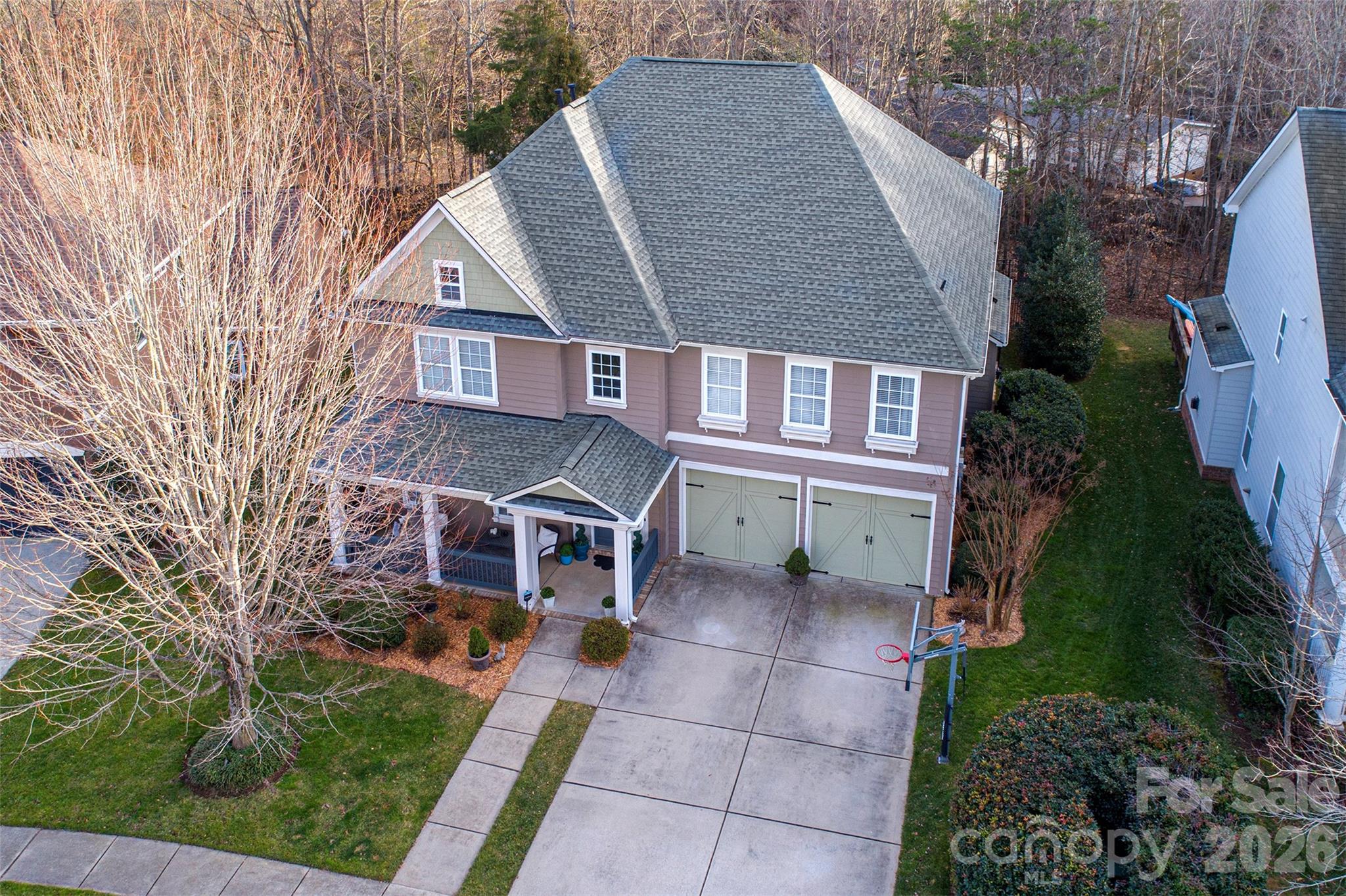 18432 East Marbella Lane Fort Mill, SC 29707 - Photo 3 of 47 a aerial view of a house with a yard and potted plants