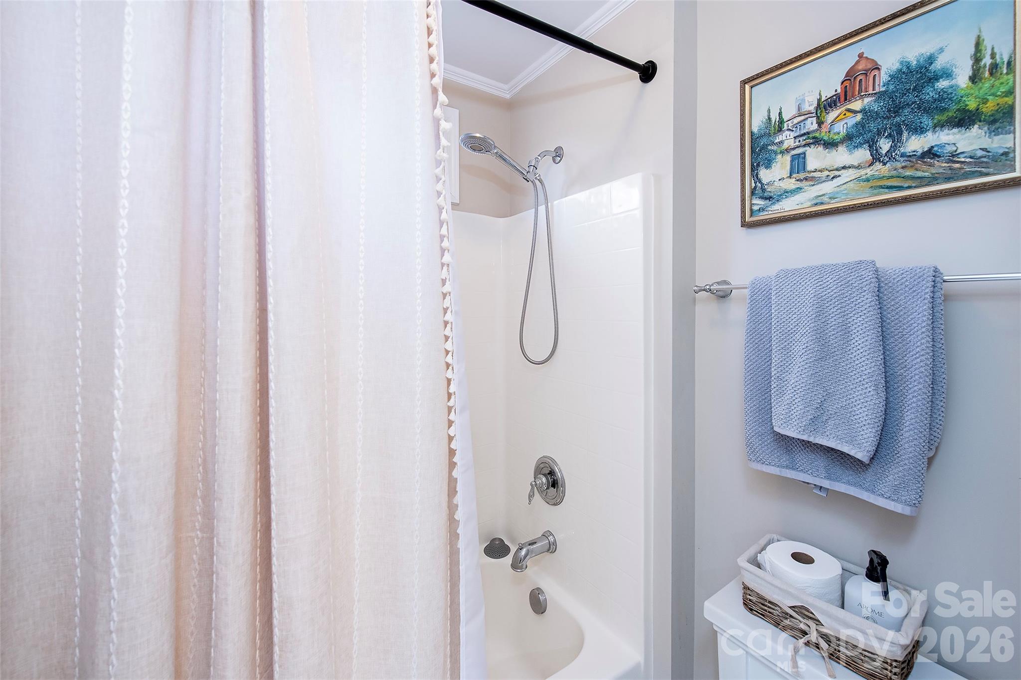 18432 East Marbella Lane Fort Mill, SC 29707 - Photo 34 of 47 a bathroom with a picture of a bathroom with a shower curtain and a shower curtain