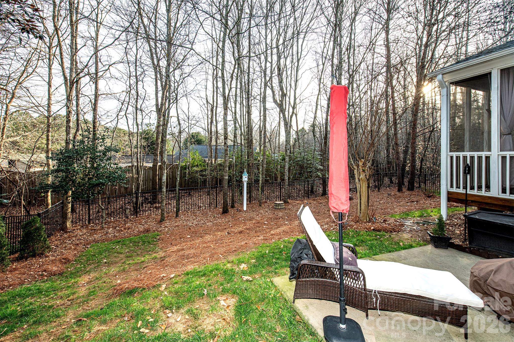 18432 East Marbella Lane Fort Mill, SC 29707 - Photo 41 of 47 a house view with a sitting space and garden
