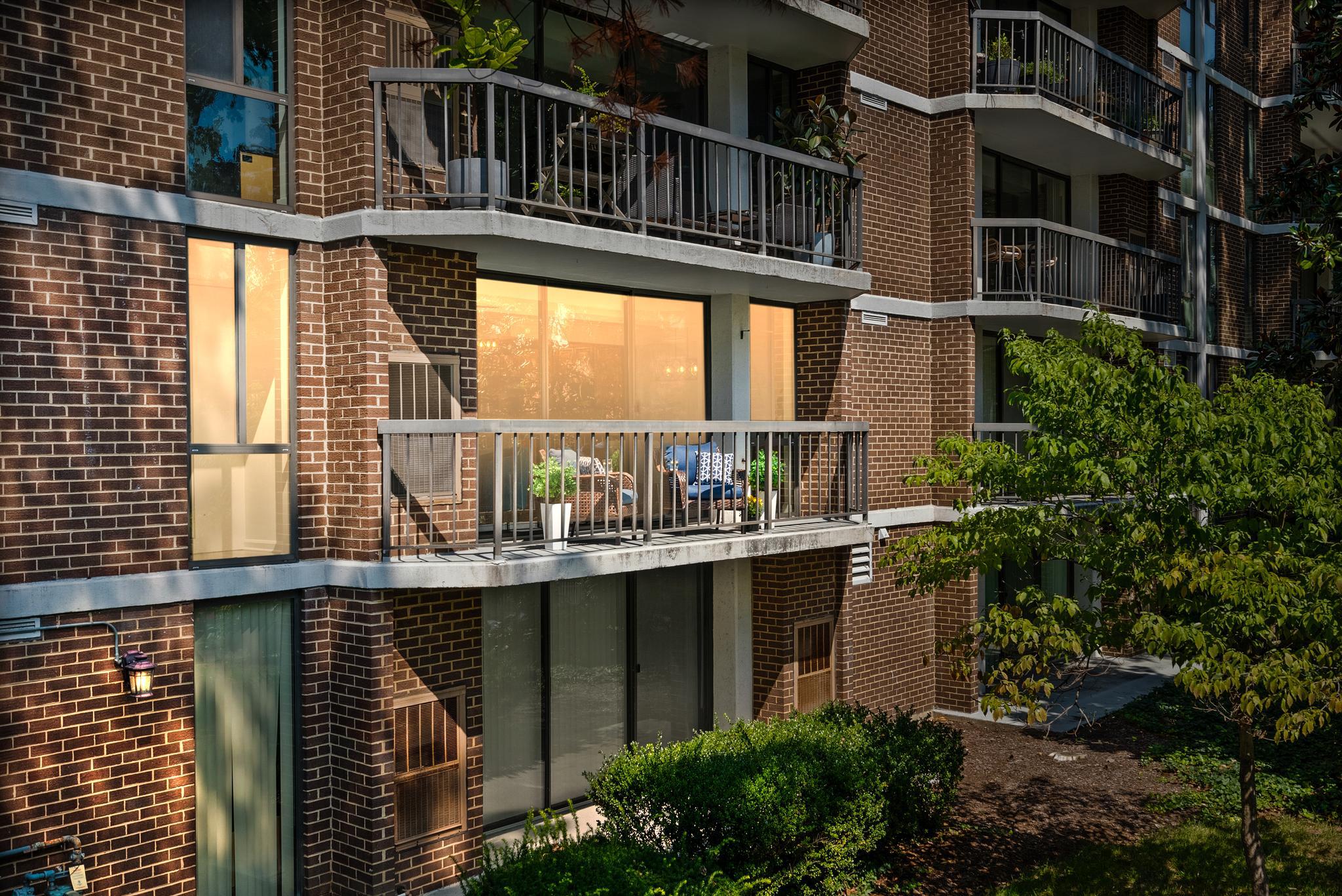 1401 North Rhodes Street, Unit 102 Arlington, VA 22209 - Photo 20 of 21 a view of a building from a balcony