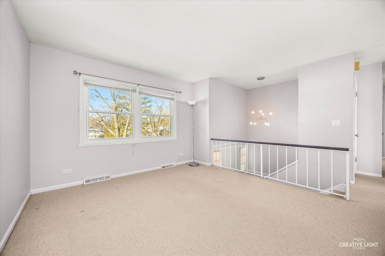 N071 Stanley Street Wheaton, IL 60187 - Photo 4 of 29 an empty room with windows