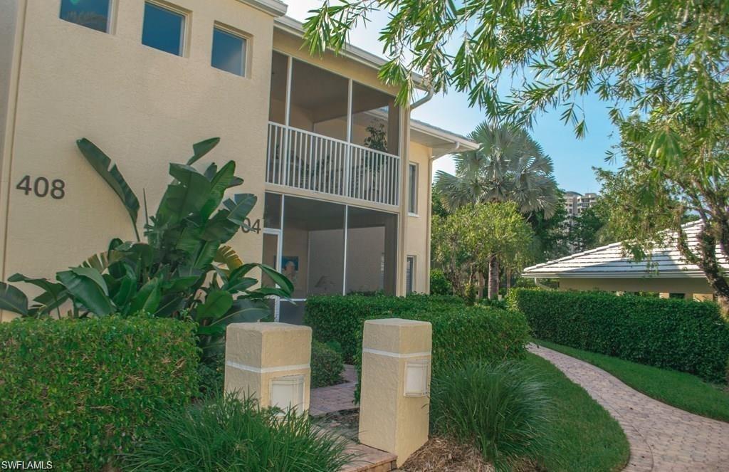 a view of an house with backyard space and garden