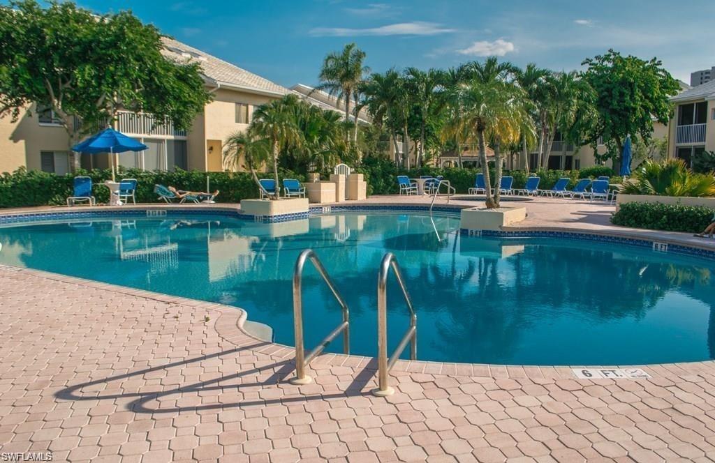 5817 Glencove Drive, Unit 404 Naples, FL 34108 - Photo 17 of 21 a view of a lake view