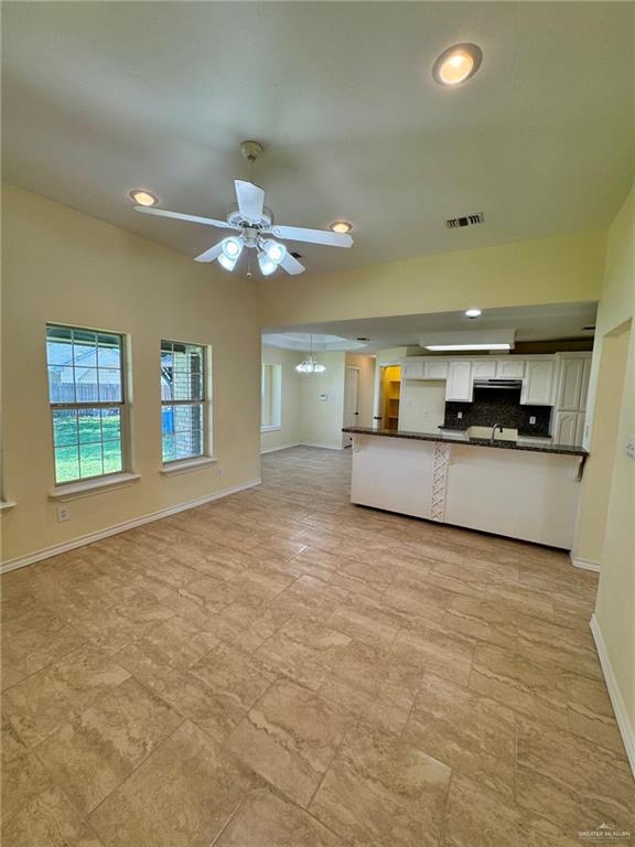 2207 Turtle Court Mission, TX 78572 - Photo 6 of 22 a view of a kitchen with a sink and a kitchen
