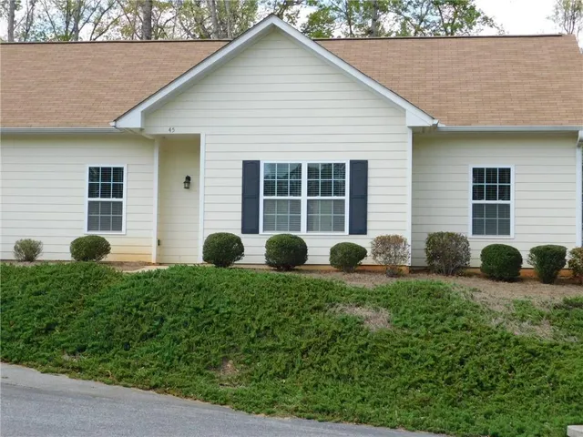 a house view with a backyard space