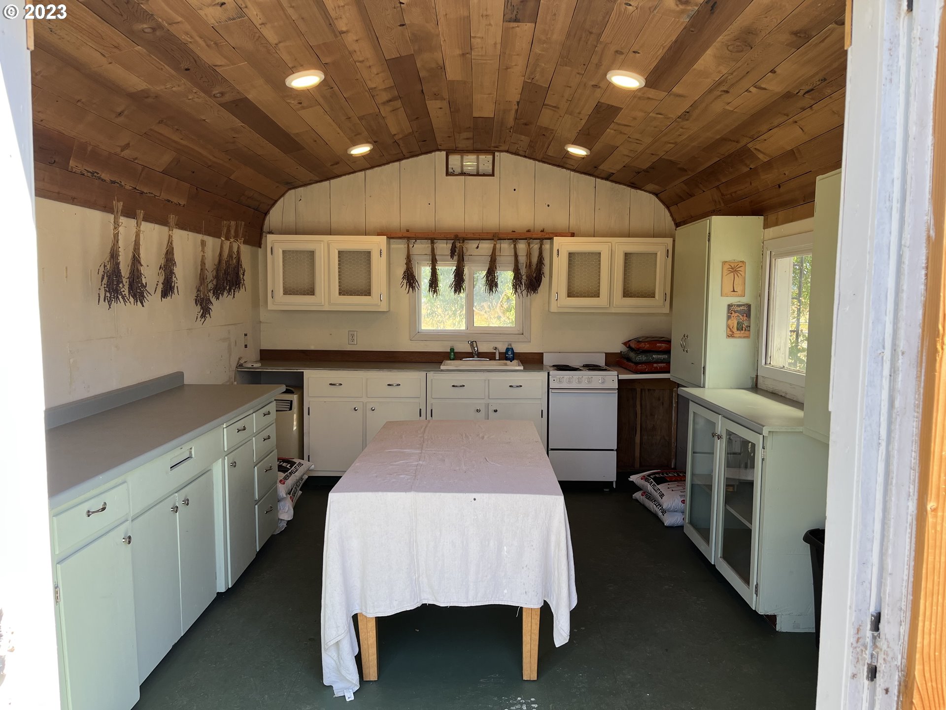 1870 Plat I Road Sutherlin, OR 97479 - Photo 34 of 47 a kitchen with stainless steel appliances granite countertop a sink and cabinets