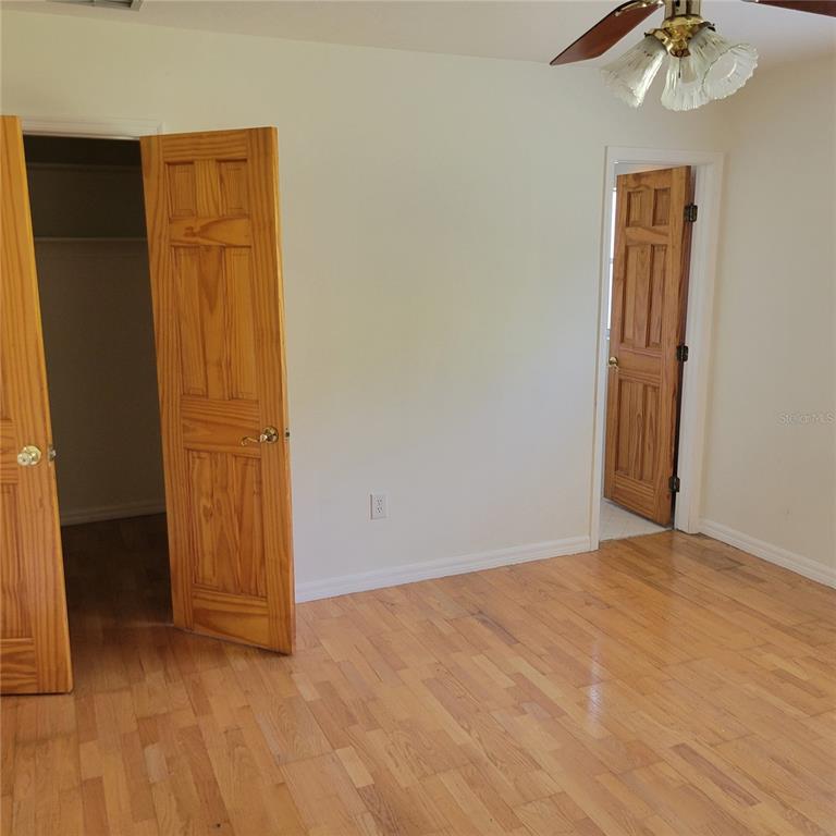1661 Votaw Road Apopka, FL 32703 - Photo 11 of 23 an empty room with closet area