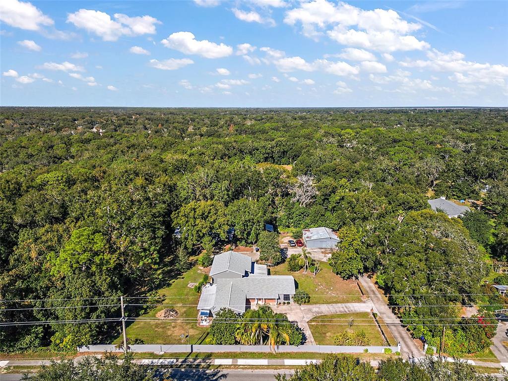 1661 Votaw Road Apopka, FL 32703 - Photo 2 of 23 an aerial view of residential houses with outdoor space