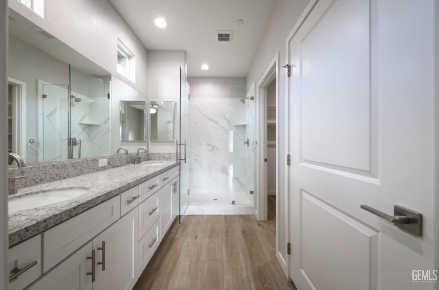Undisclosed Address Shafter, CA 93263 - Photo 17 of 33 a bathroom with a granite countertop sink mirror and double