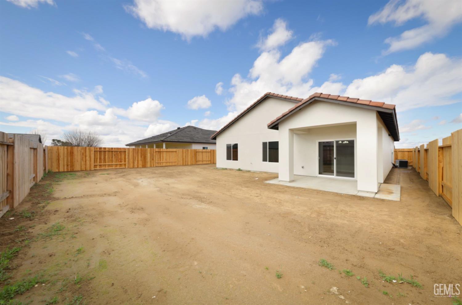Undisclosed Address Shafter, CA 93263 - Photo 31 of 33 a view of a house with a backyard