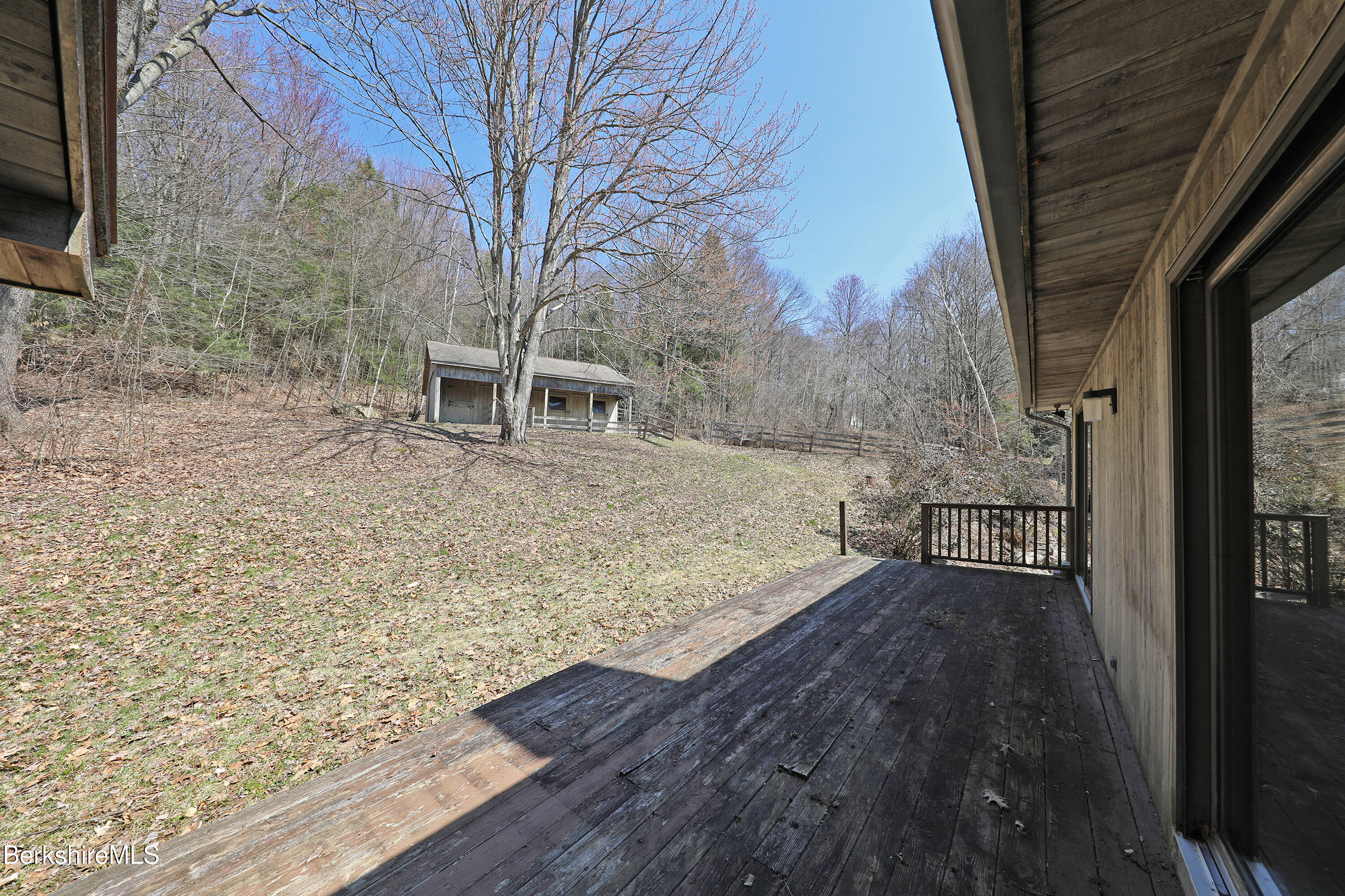 519 Kirchner Road Dalton, MA 01226 - Photo 12 of 42 a view of a backyard with wooden floor and large trees