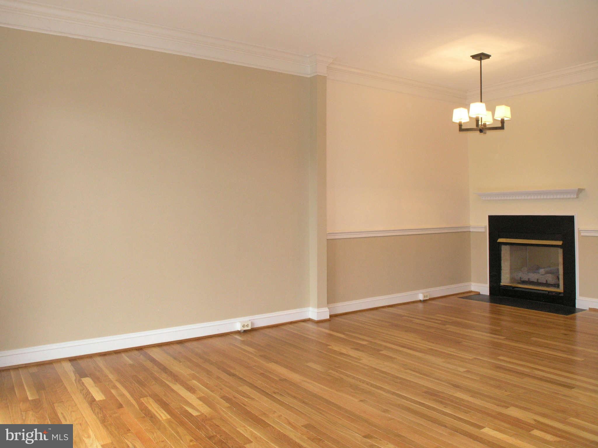 1302 Sundial Drive Reston, VA 20194 - Photo 9 of 30 Living to Dining Room