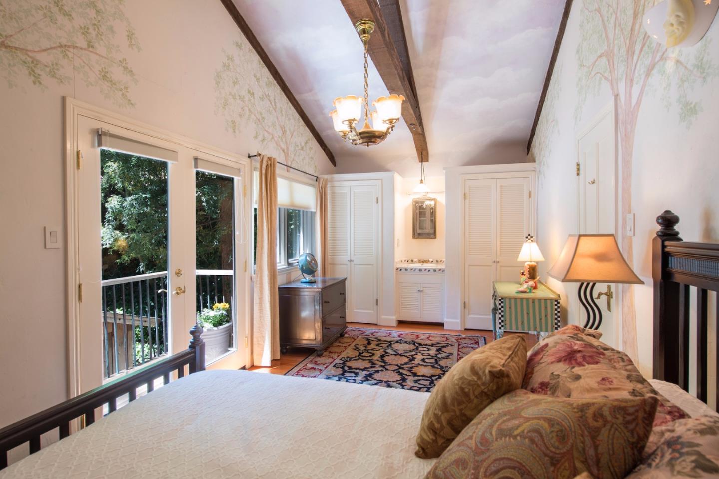135 Summit Road Woodside, CA 94062 - Photo 14 of 27 a bedroom with furniture and a window