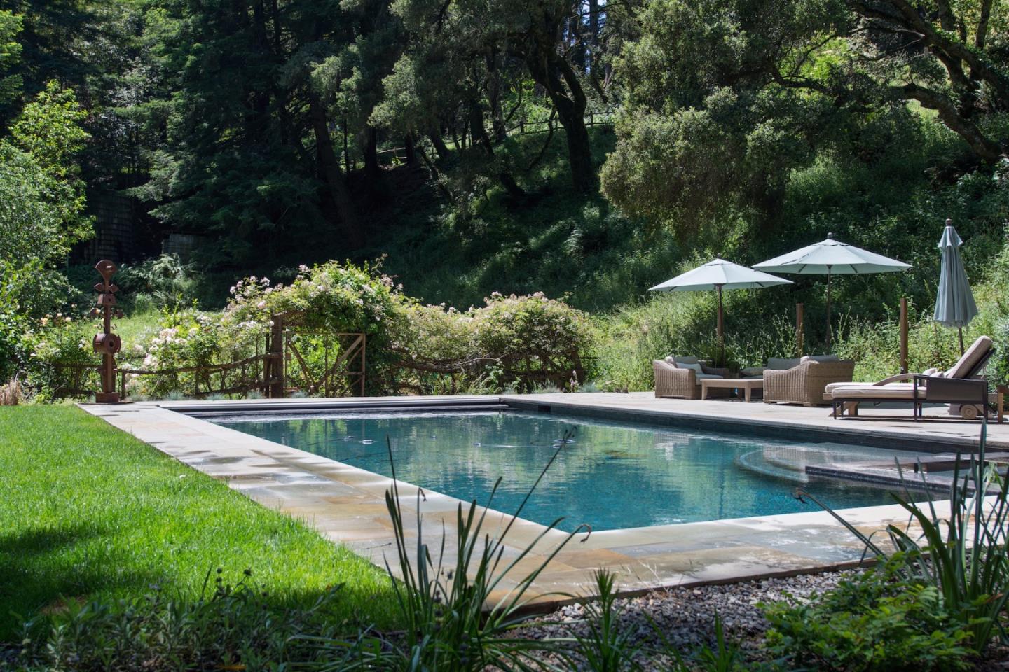 135 Summit Road Woodside, CA 94062 - Photo 20 of 27 a view of a lake with a house in the background