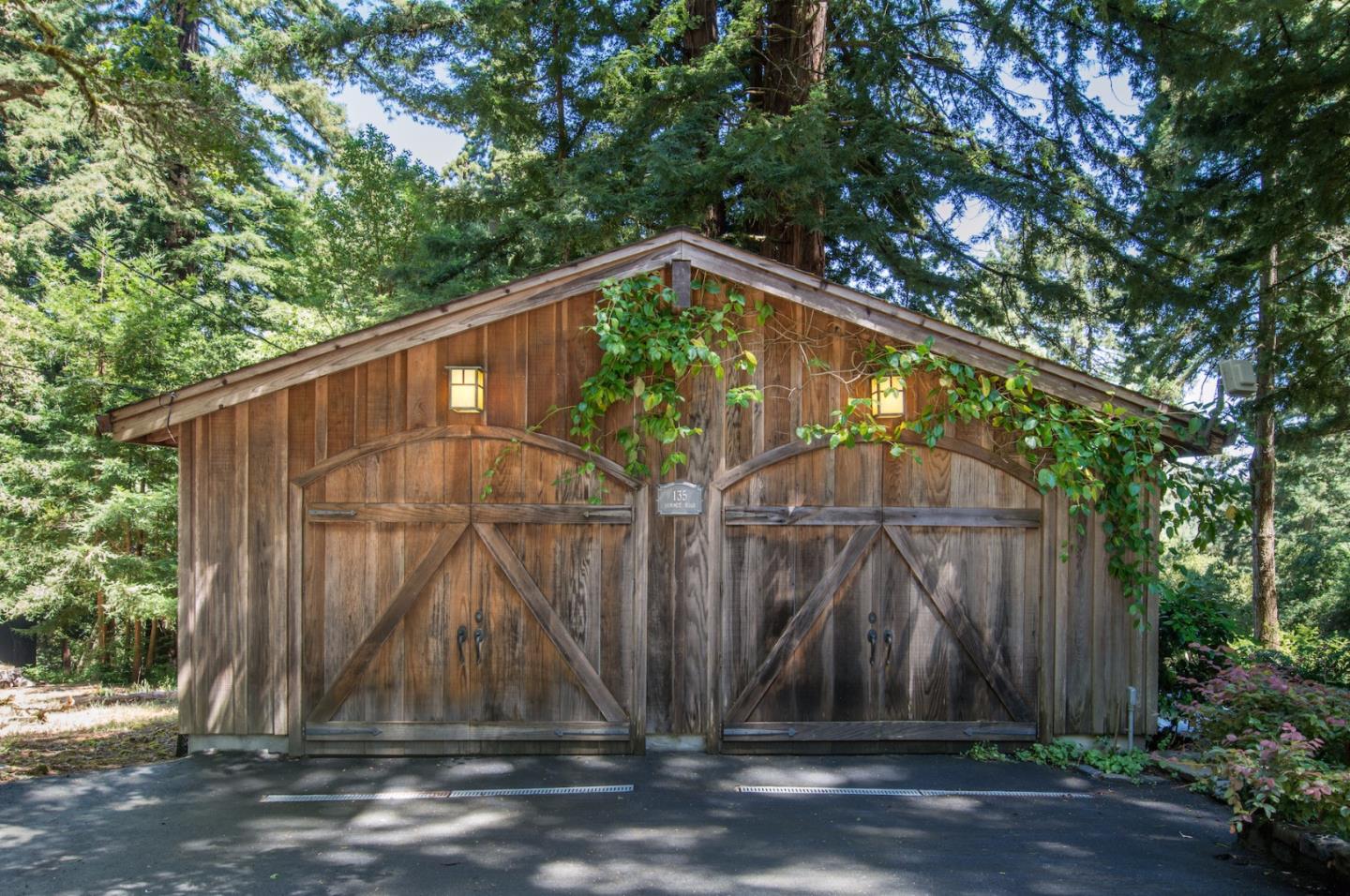 135 Summit Road Woodside, CA 94062 - Photo 24 of 27 a backyard of a house with lots of green space