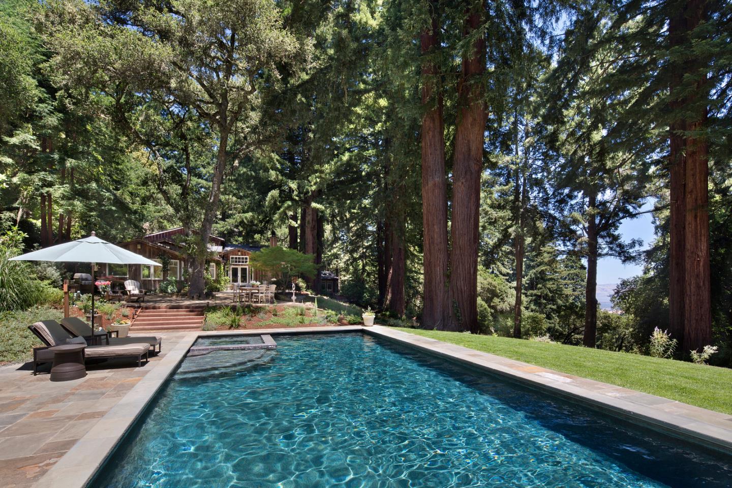 135 Summit Road Woodside, CA 94062 - Photo 3 of 27 a garden view with a seating space