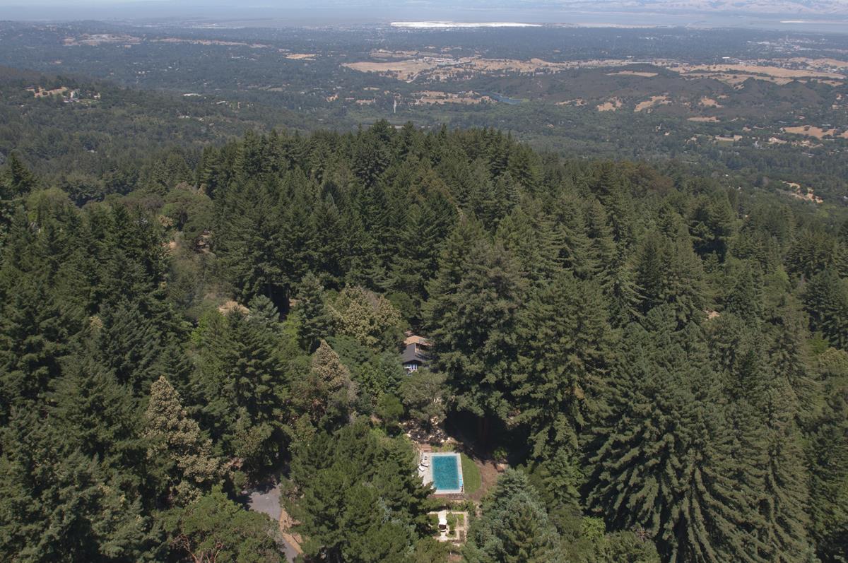 135 Summit Road Woodside, CA 94062 - Photo 8 of 27 an aerial view of house with yard and mountain view in back