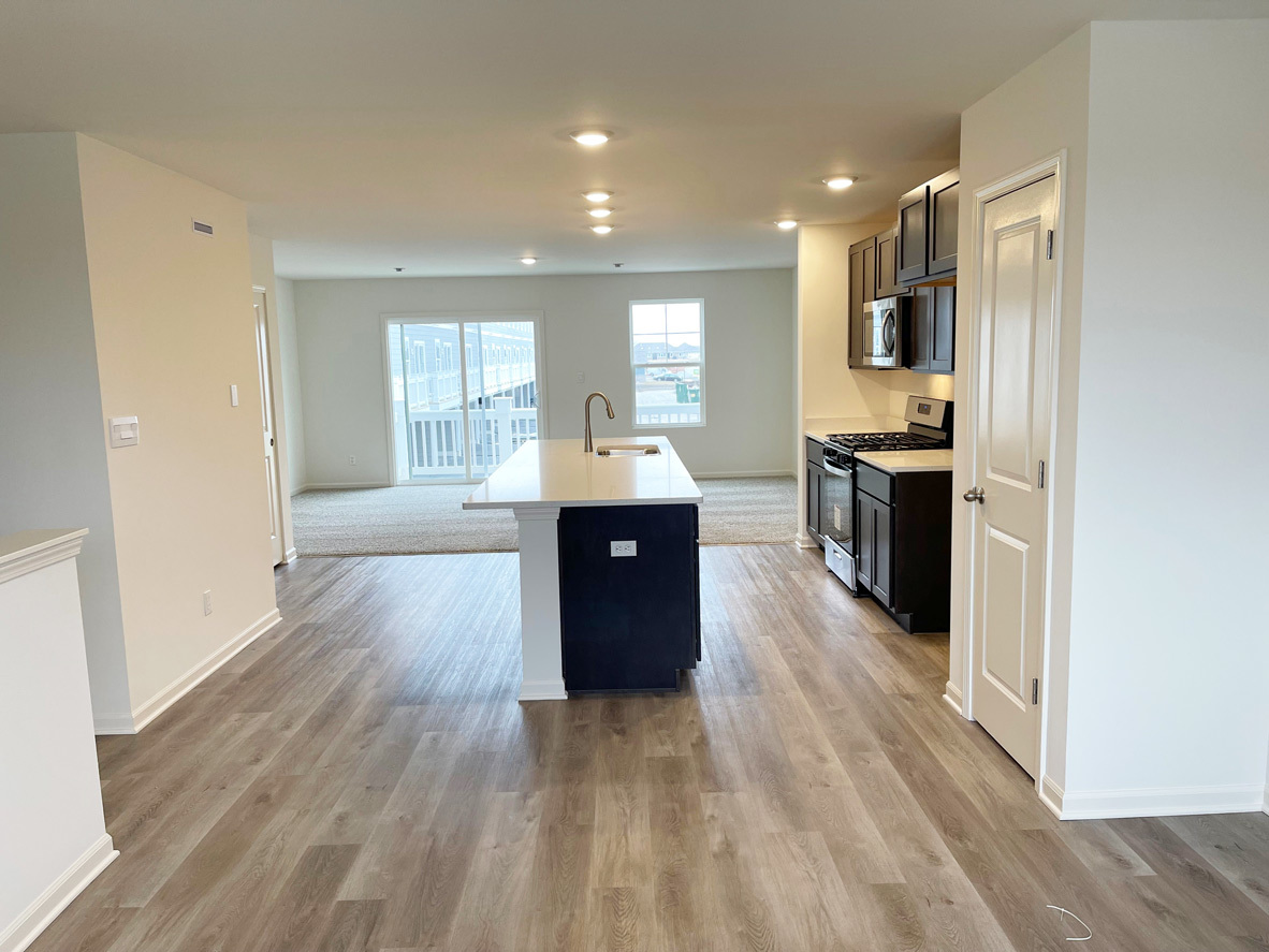 6388 Roscommon Road Tinley Park, IL 60477 - Photo 20 of 21 a view of kitchen with sink and wooden floor
