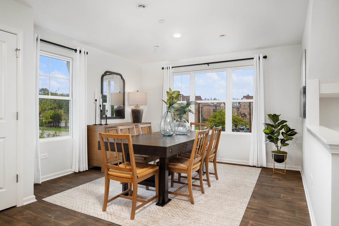 6388 Roscommon Road Tinley Park, IL 60477 - Photo 4 of 21 a view of a dining room with furniture window and wooden floor