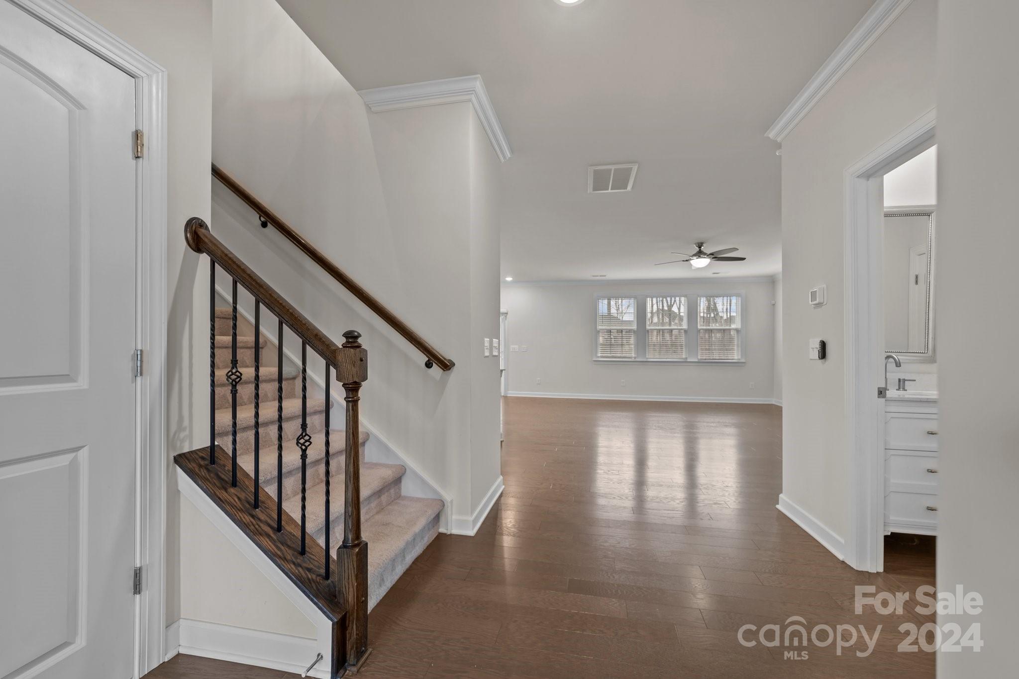 15741 Queens Trail Drive Davidson, NC 28036 - Photo 21 of 48 a view of an entryway with wooden floor