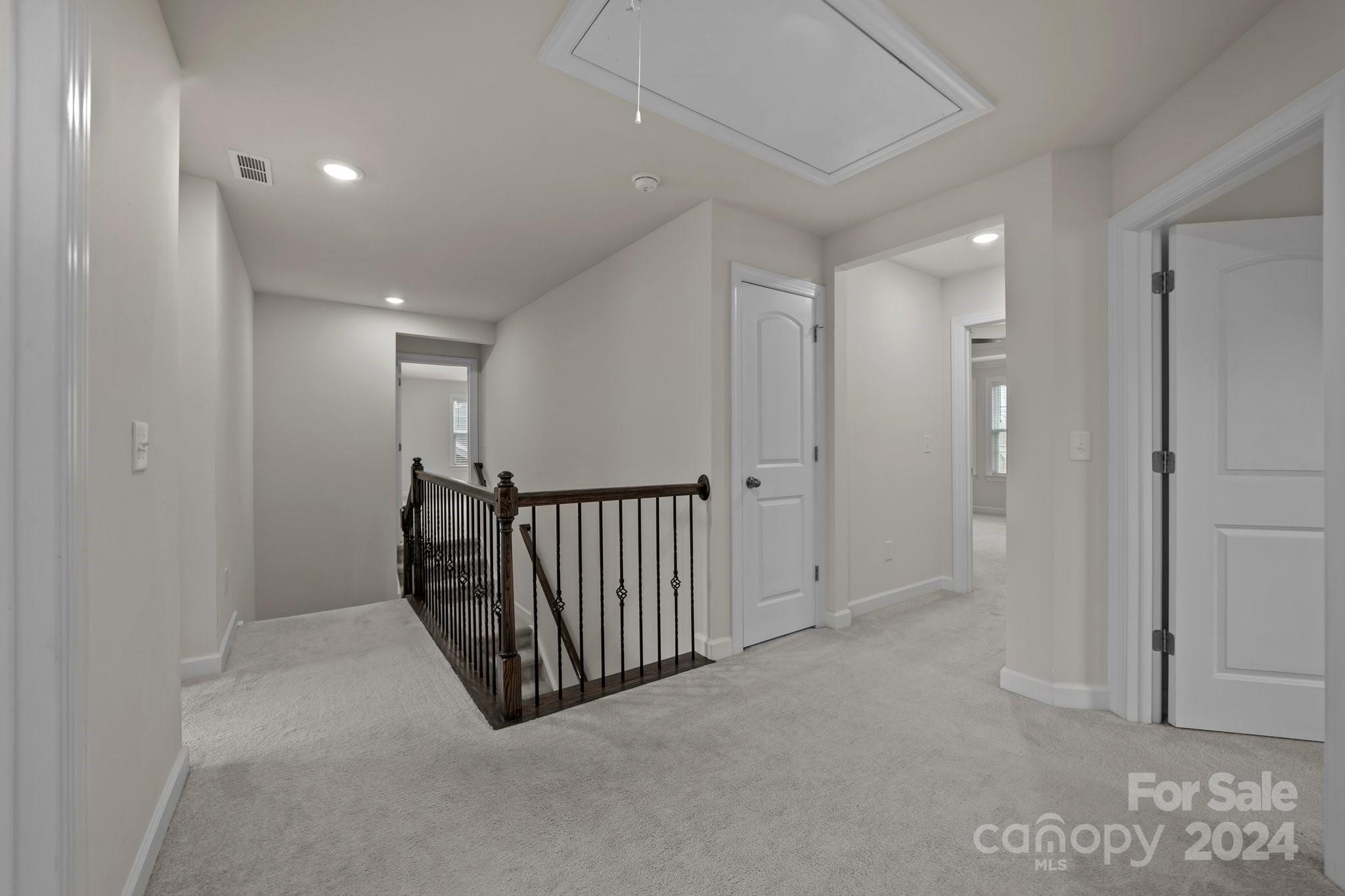 15741 Queens Trail Drive Davidson, NC 28036 - Photo 33 of 48 a view of a hallway