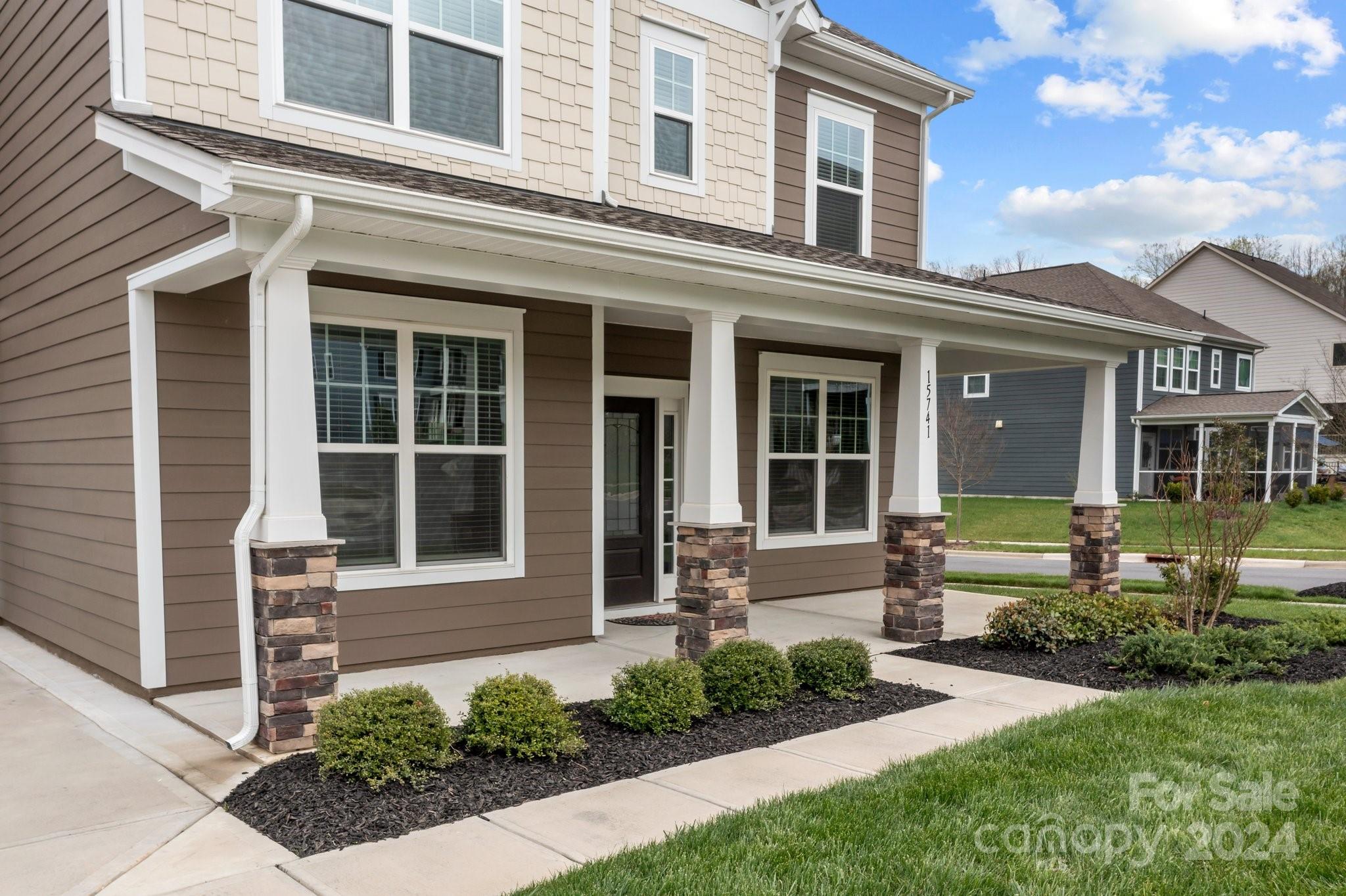 15741 Queens Trail Drive Davidson, NC 28036 - Photo 46 of 48 front view of a house with a yard