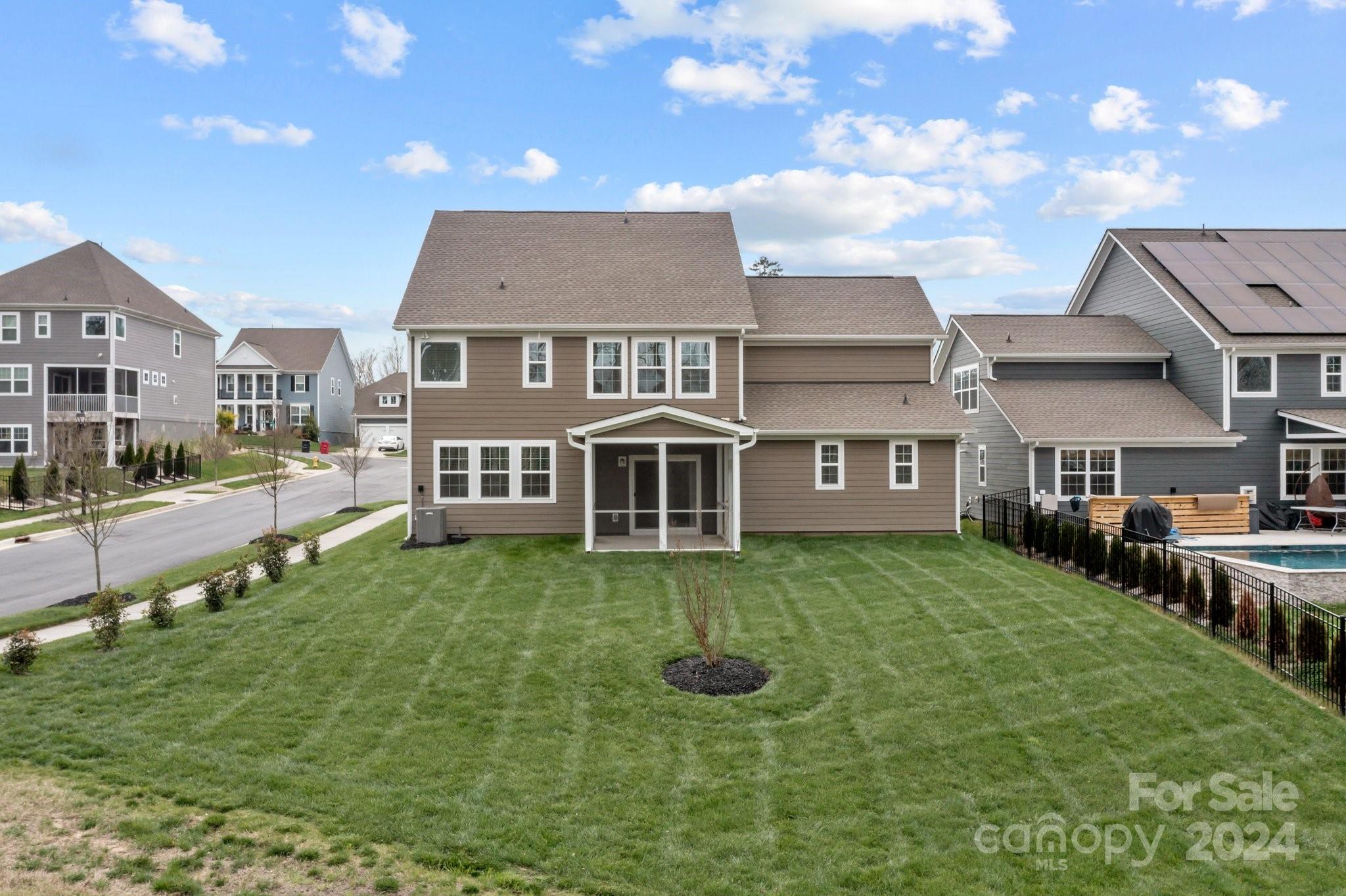 15741 Queens Trail Drive Davidson, NC 28036 - Photo 7 of 48 a front view of a house with a yard