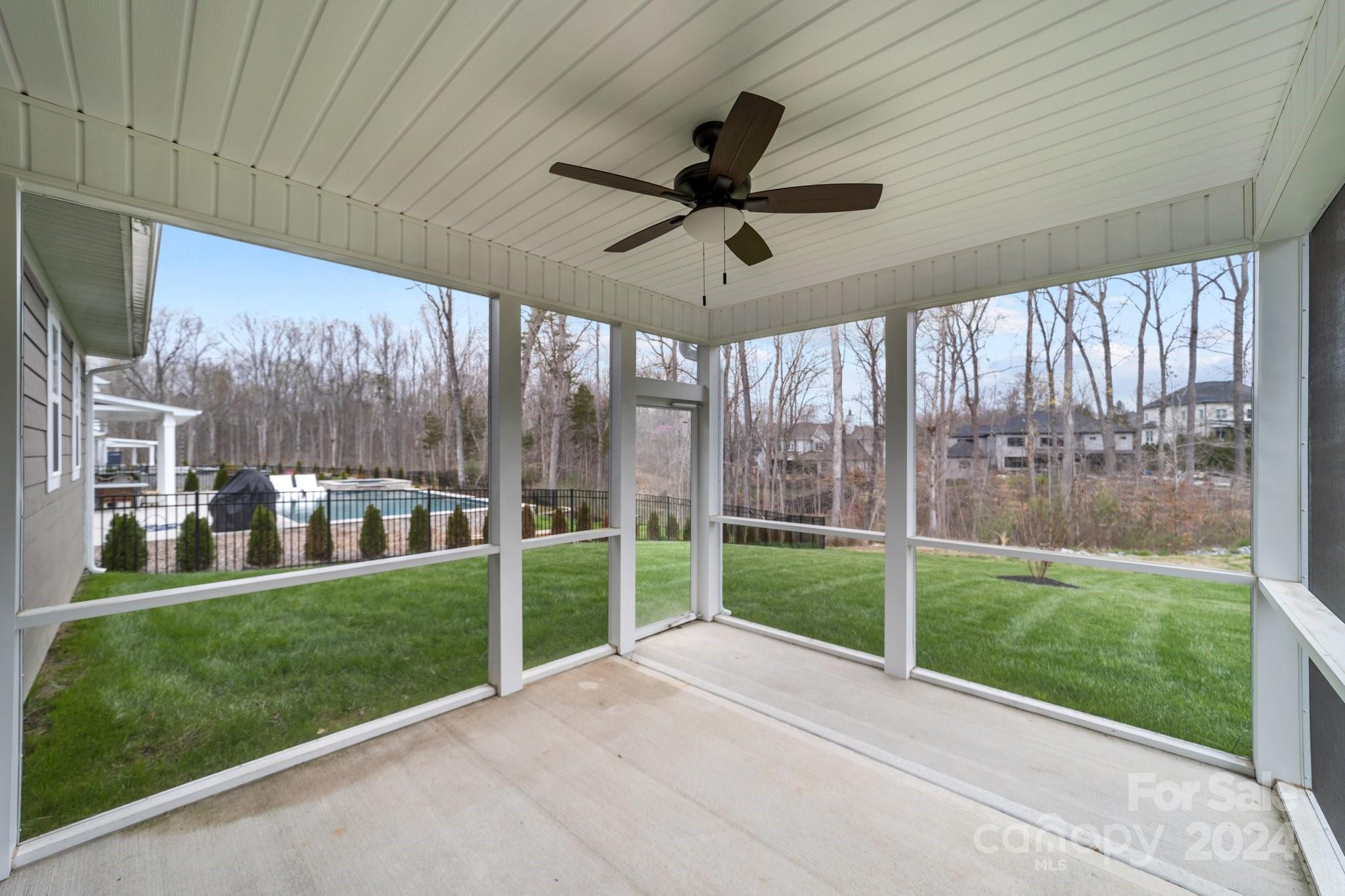 15741 Queens Trail Drive Davidson, NC 28036 - Photo 10 of 48 a view of a porch and garden