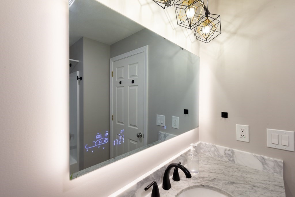 6 King Street Arlington, MA 02474 - Photo 30 of 37 a bathroom with a bathtub and shower