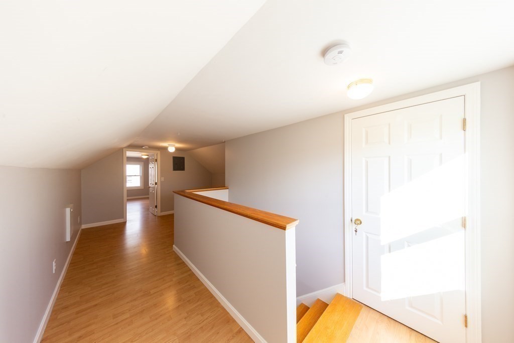 6 King Street Arlington, MA 02474 - Photo 31 of 37 a view of a hallway with furniture