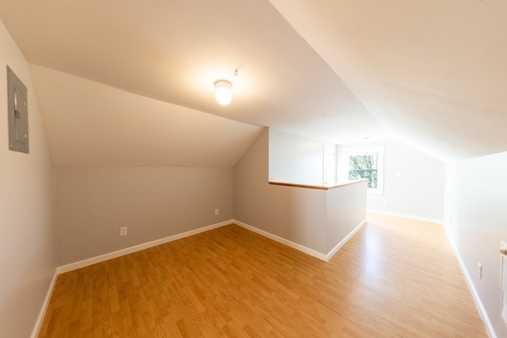 6 King Street Arlington, MA 02474 - Photo 34 of 37 a view of empty room with wooden floor