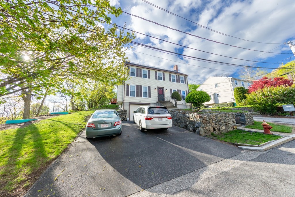 6 King Street Arlington, MA 02474 - Photo 36 of 37 a view of a street with cars parked