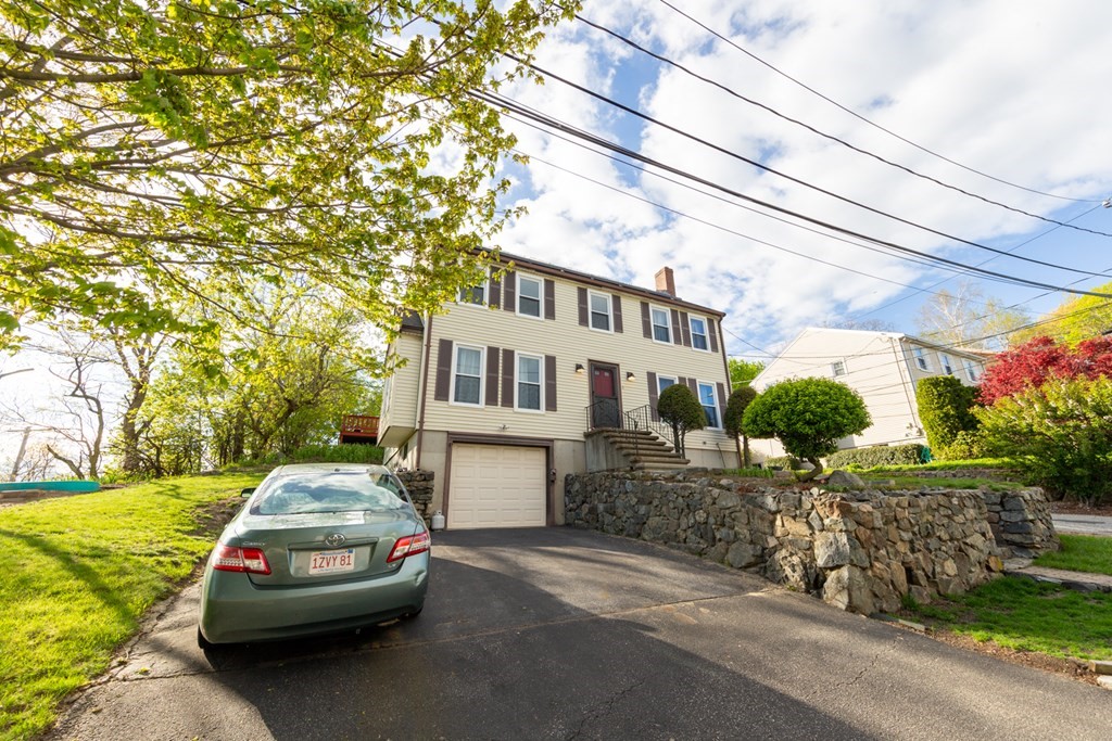 6 King Street Arlington, MA 02474 - Photo 37 of 37 a car parked in front of a house