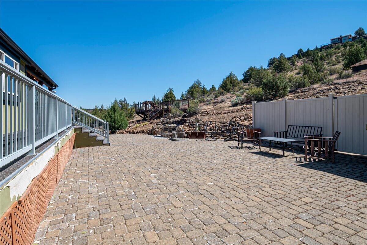 11182 Southwest Dynamite Lane Culver, OR 97734 - Photo 13 of 70 a view of a terrace with a bench