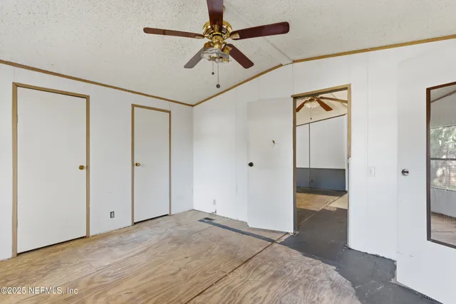 a view of a livingroom with a flat screen tv