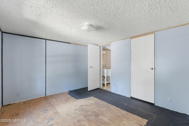 a view of a room with an empty space