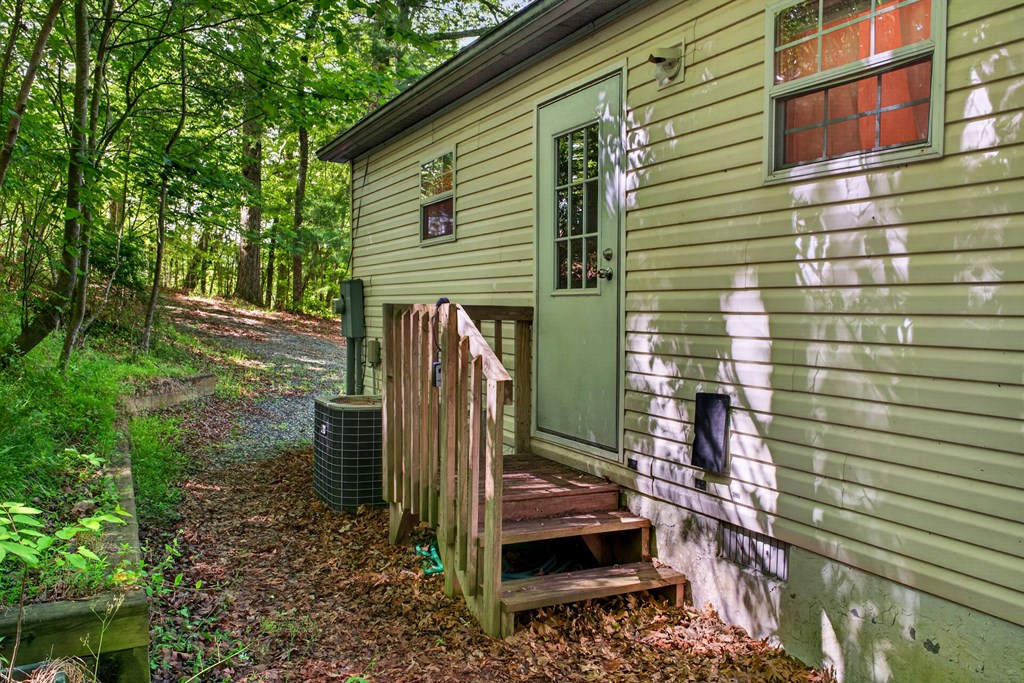 282 West Cherry Road Hayesville, NC 28904 - Photo 22 of 45 a view of a house with a backyard