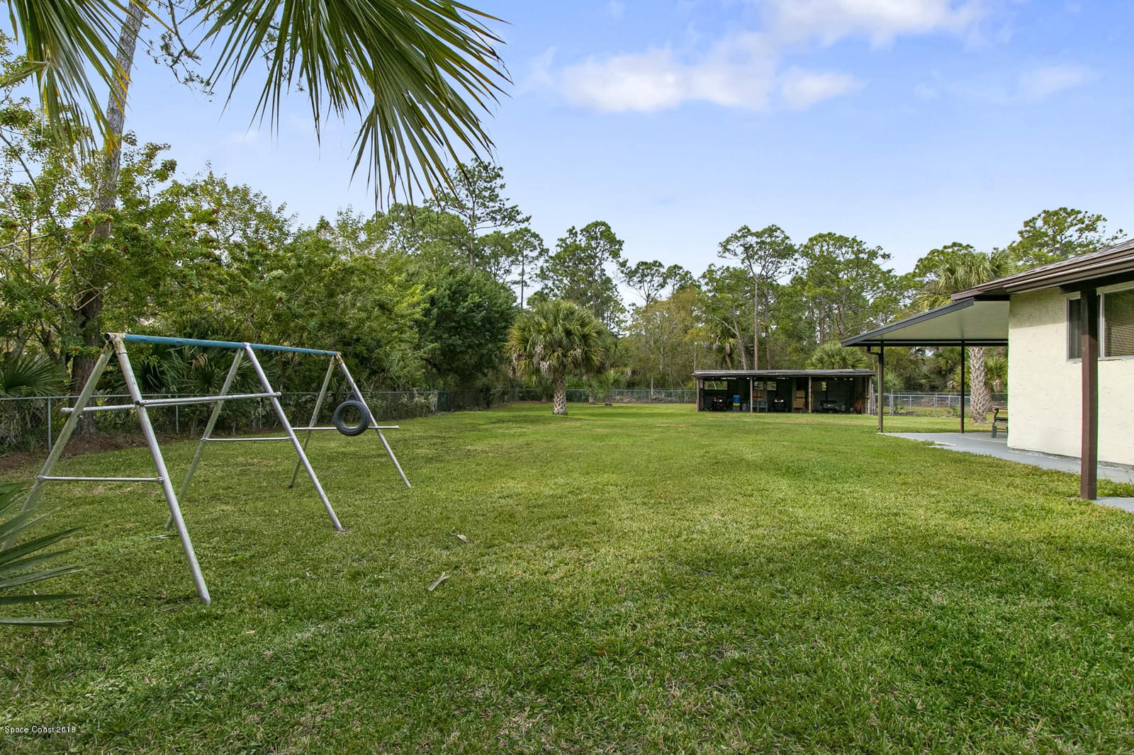 3830 Corey Road Grant Valkaria, FL 32950 - Photo 29 of 38 Side yard