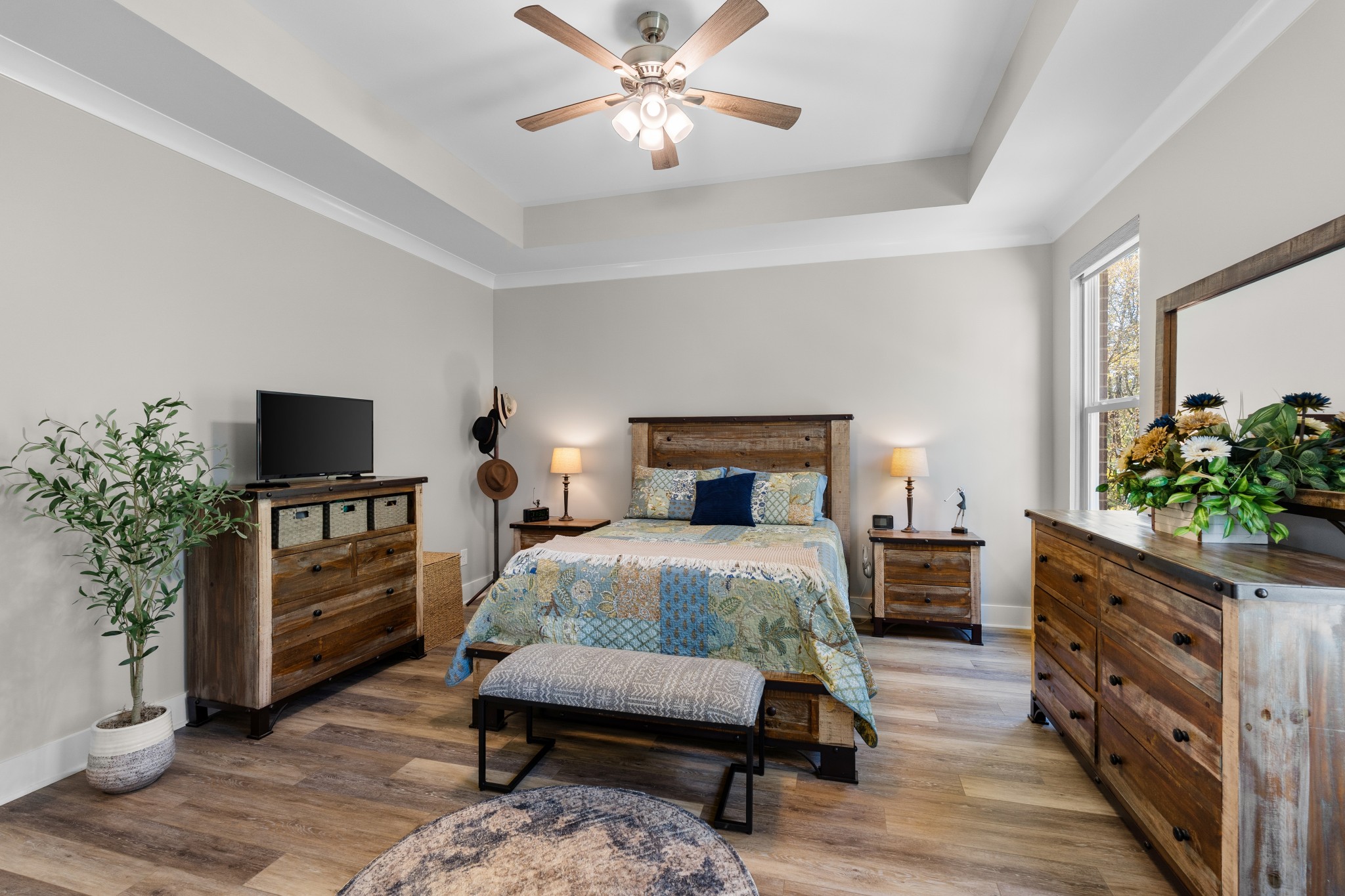 259 Caroline Way Mount Juliet, TN 37122 - Photo 12 of 35 a bedroom with a bed and a television