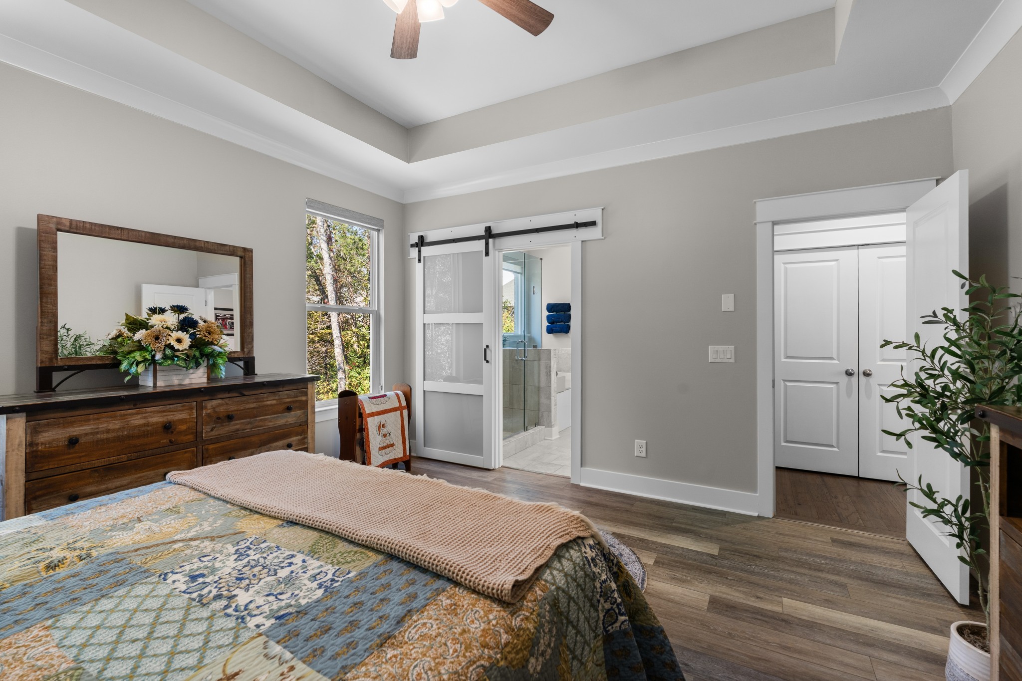 259 Caroline Way Mount Juliet, TN 37122 - Photo 13 of 35 a bedroom with a bed and a dresser