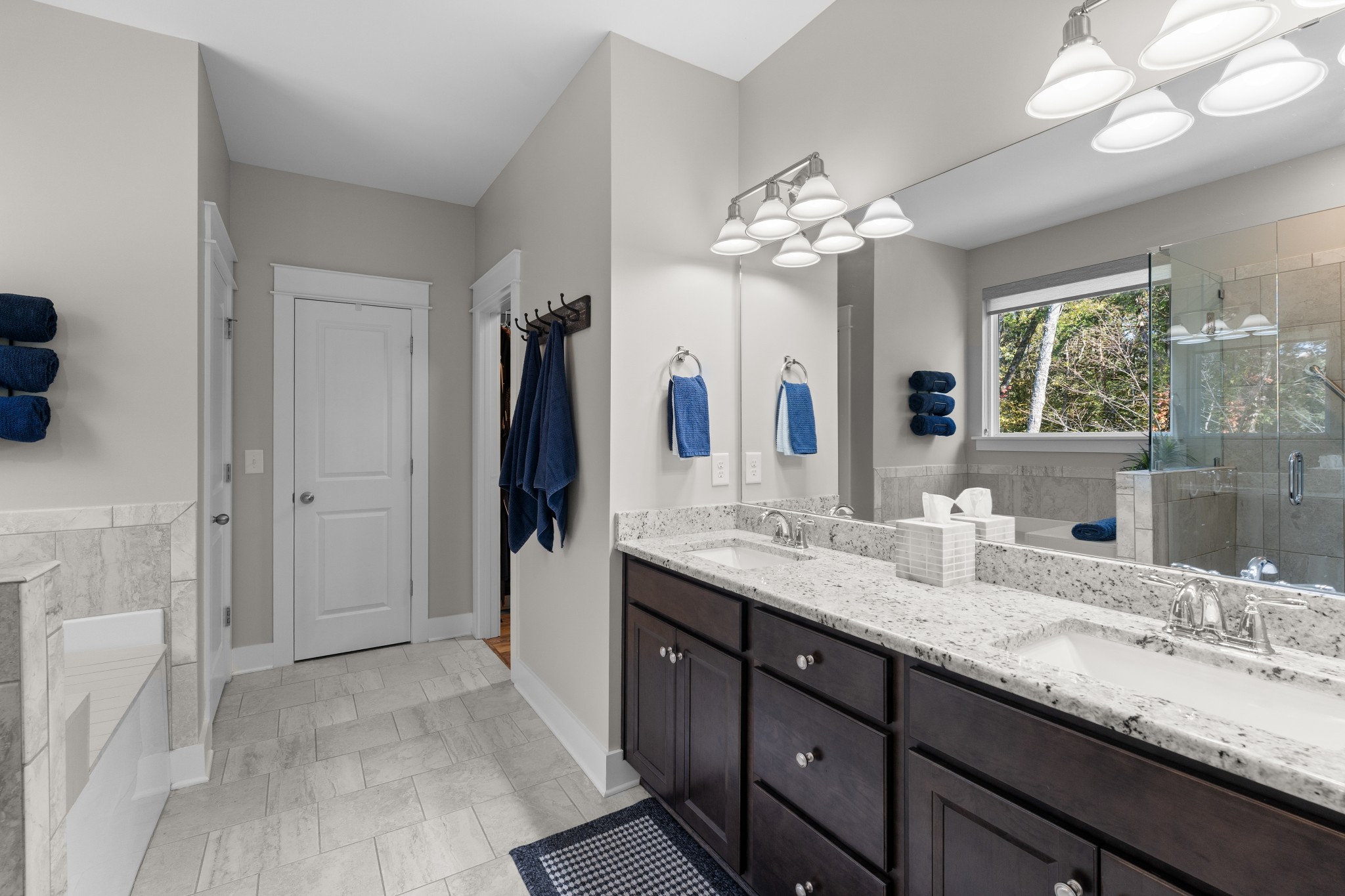 259 Caroline Way Mount Juliet, TN 37122 - Photo 15 of 35 a bathroom with a double vanity sink and a mirror