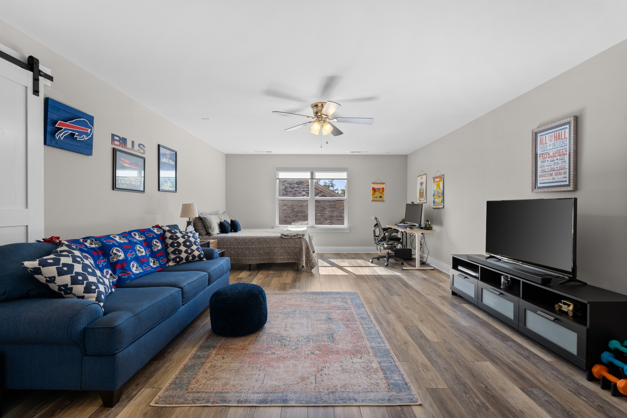 259 Caroline Way Mount Juliet, TN 37122 - Photo 21 of 35 a living room with furniture and a flat screen tv