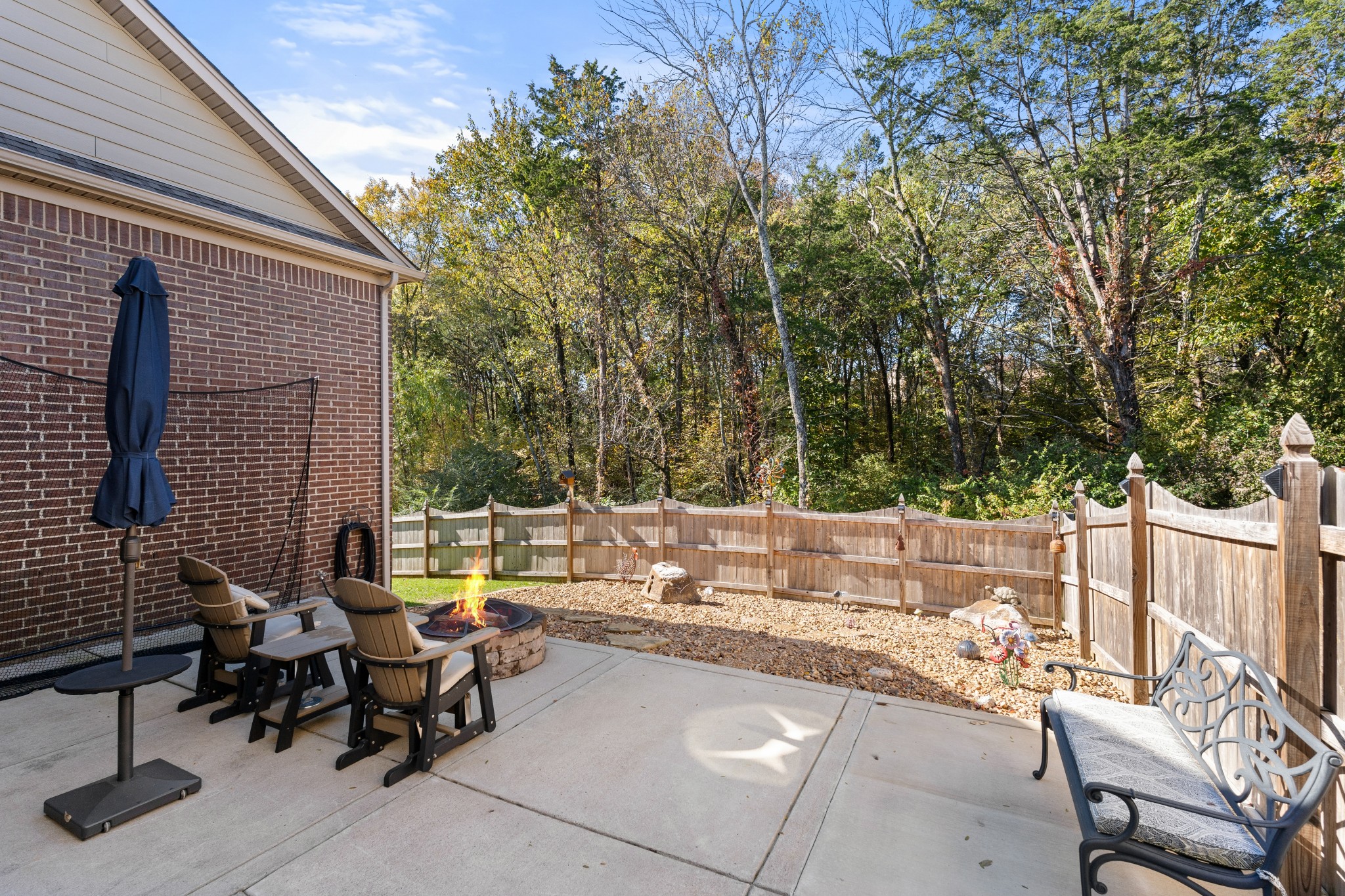 259 Caroline Way Mount Juliet, TN 37122 - Photo 26 of 35 a view of a patio with a table and chairs