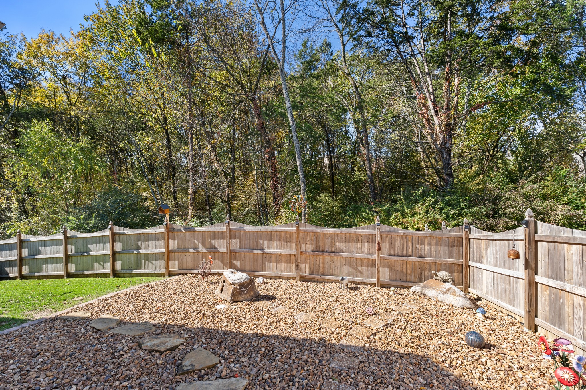 259 Caroline Way Mount Juliet, TN 37122 - Photo 27 of 35 a view of a backyard with wooden fence