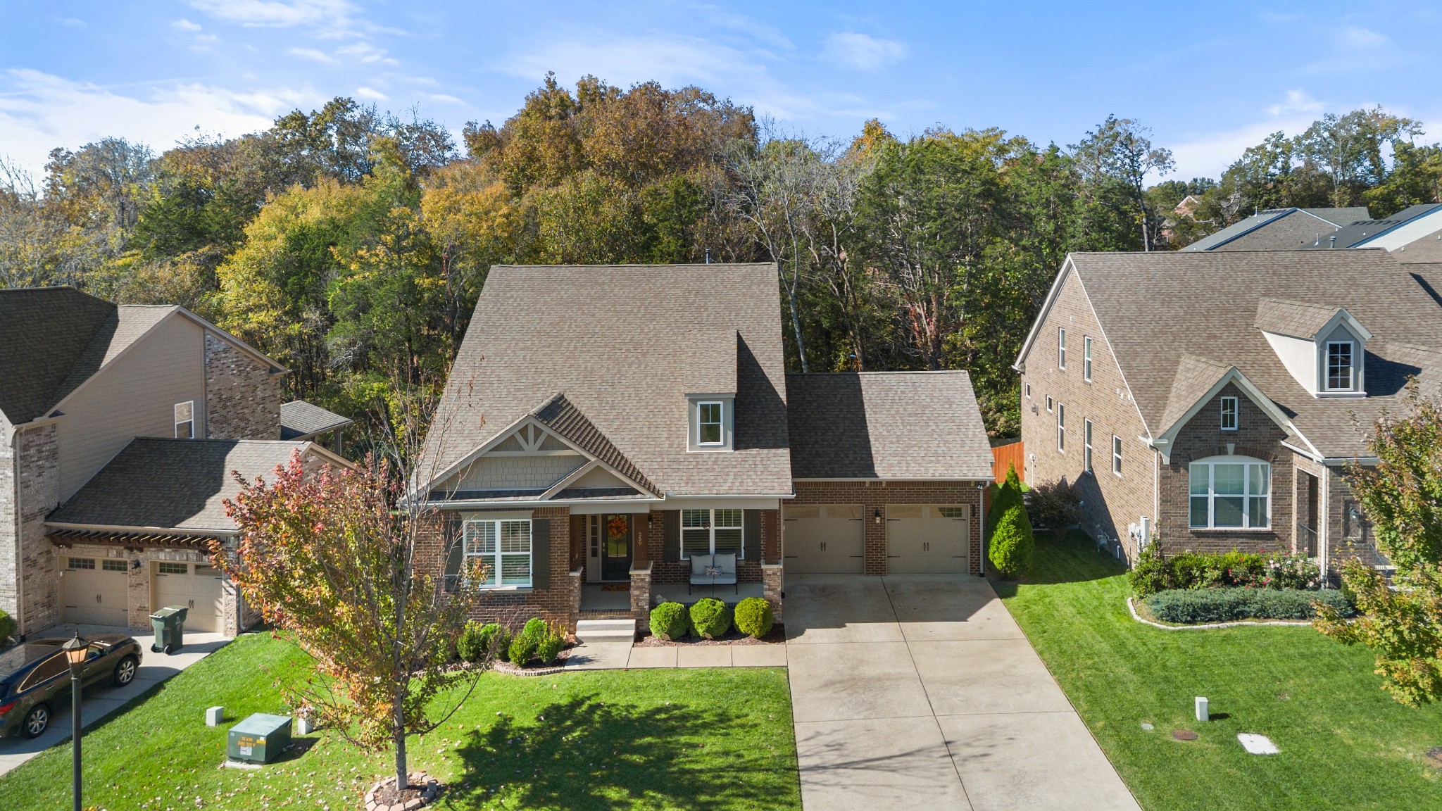 259 Caroline Way Mount Juliet, TN 37122 - Photo 30 of 35 a view of house with garden and tall tress