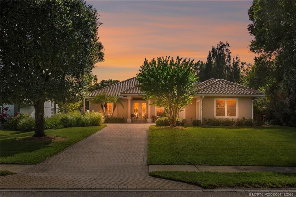 1234 Southwest Locks Road Stuart, FL 34997 - Photo 41 of 52 Front Elevation Twilight
