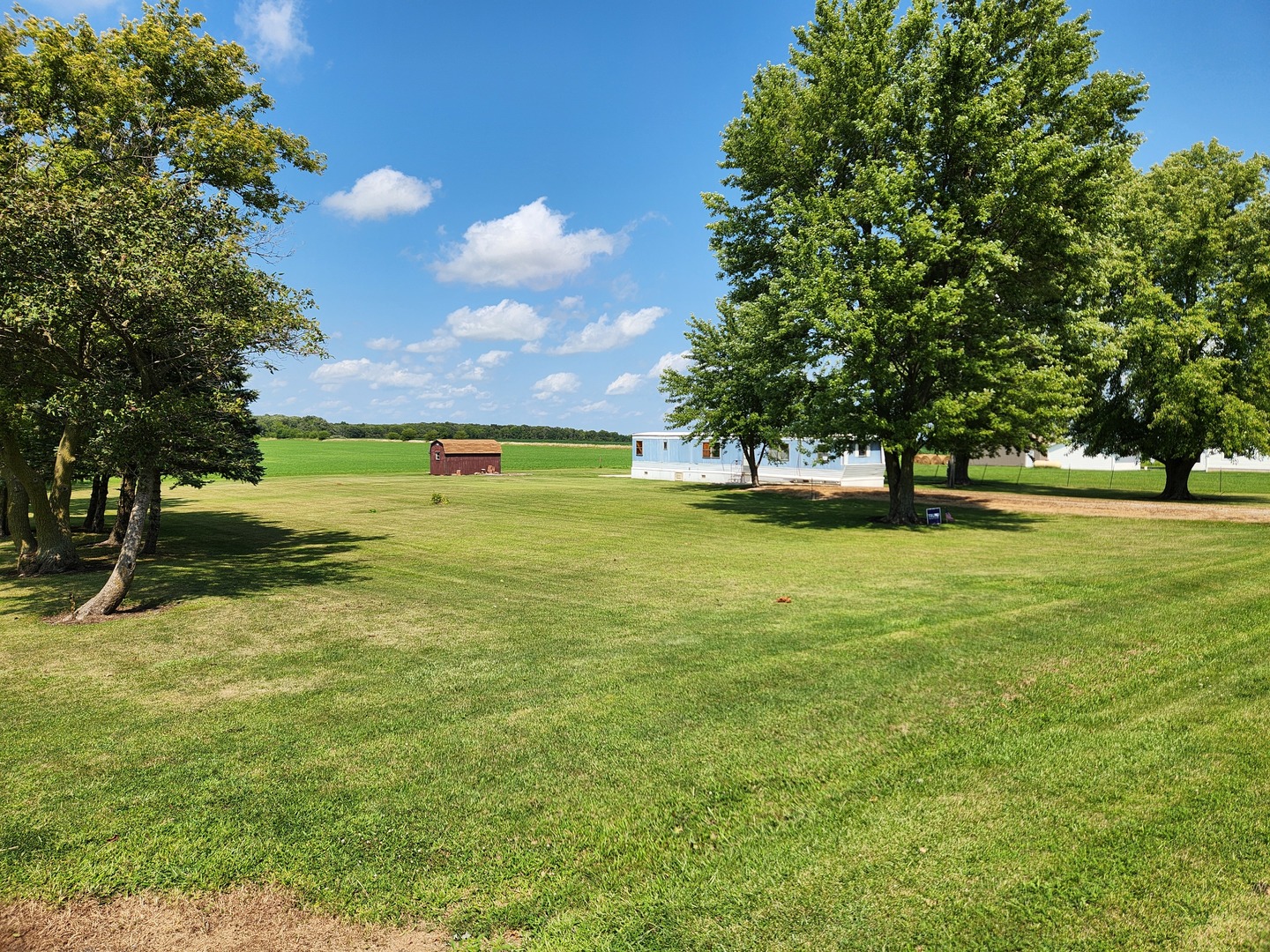 2713 North 23rd Road Marseilles, IL 61341 - Photo 1 of 9 a view of an ocean with a house in the background