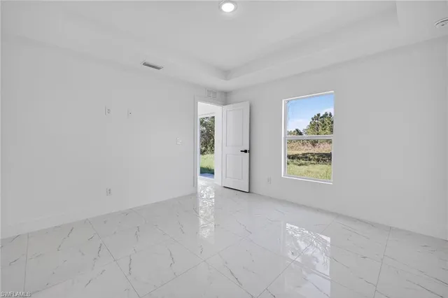 an empty room with windows