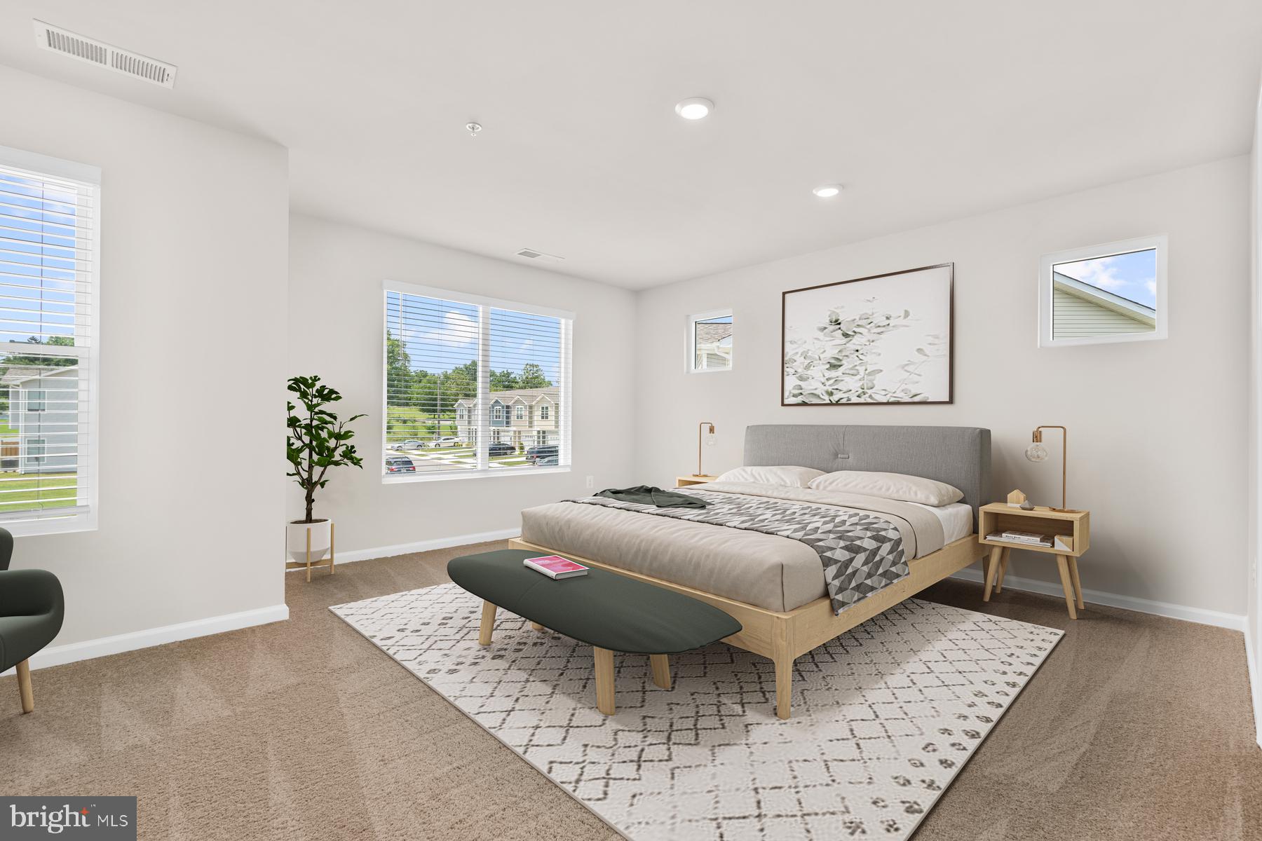 8133 Bartholomew Court Baltimore, MD 21206 - Photo 10 of 14 a spacious bedroom with a bed and window